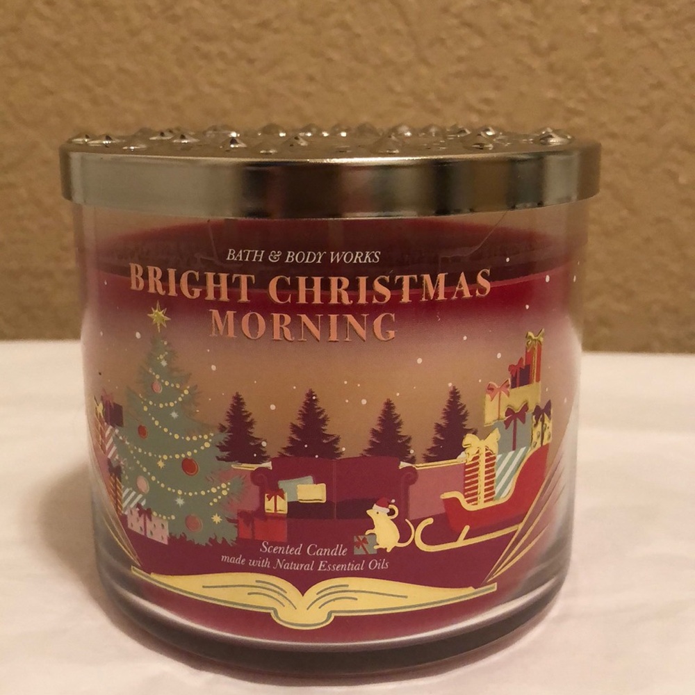 NWT Bath & Body Works Bright Christmas Morning 3 wick candle. Beautiful Lid.